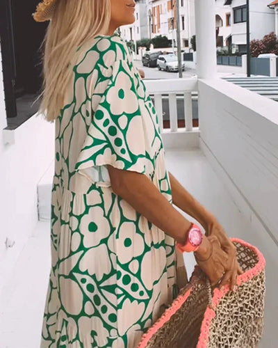 Christine™ | Vestido largo de verano con caída fluida y un estampado gráfico refinado