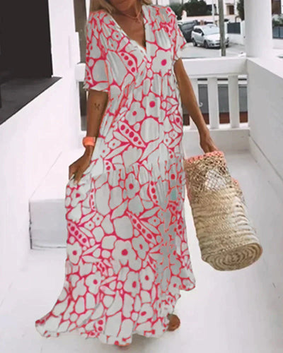 Christine™ | Vestido largo de verano con caída fluida y un estampado gráfico refinado