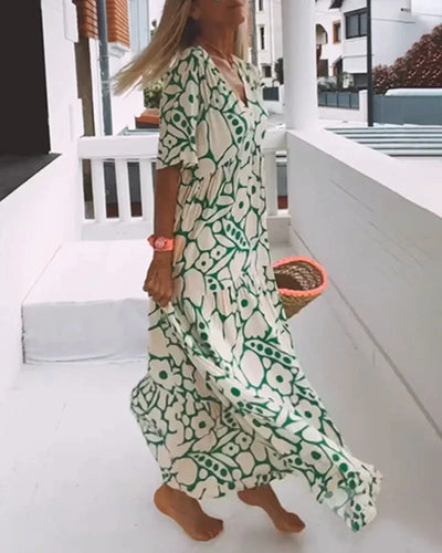 Christine™ | Vestido largo de verano con caída fluida y un estampado gráfico refinado