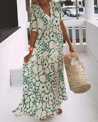 Christine™ | Vestido largo de verano con caída fluida y un estampado gráfico refinado