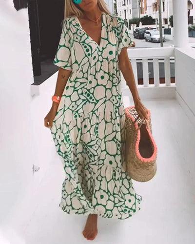 Christine™ | Vestido largo de verano con caída fluida y un estampado gráfico refinado