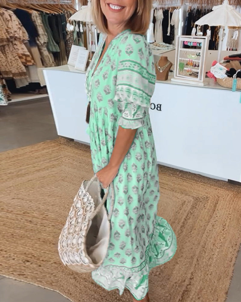 Giulia™ | Vestido midi estampado con escote en V y elegantes mangas tipo globo